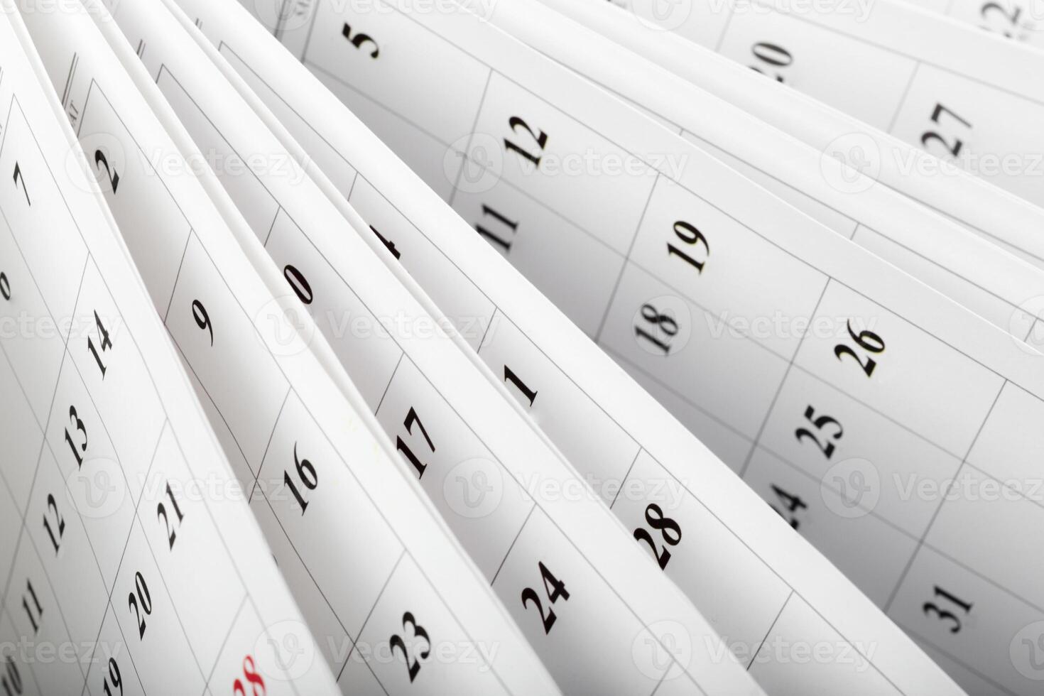 Calendar pages turned over with dates visible for personal planning tasks ahead in the year photo