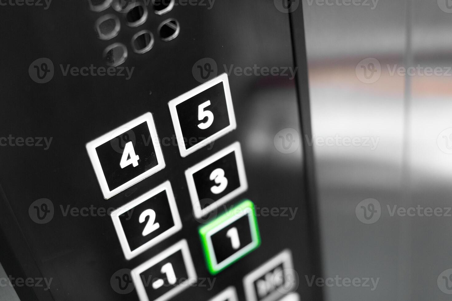 Elevator control panel showing pressed button in a modern building photo