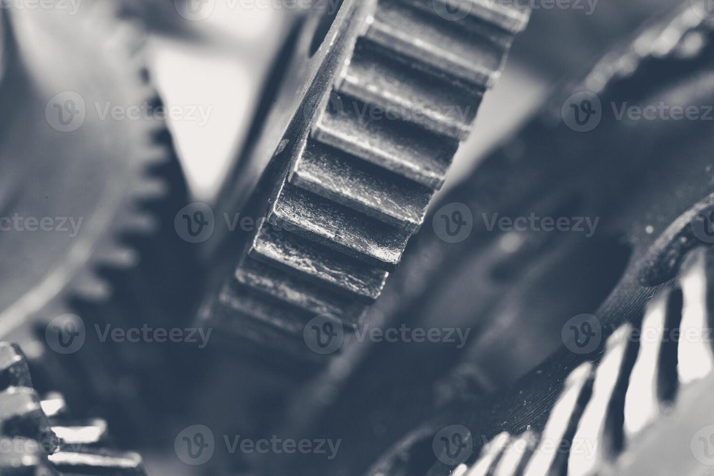 Close-up view of interlocking gears in a mechanical system at work photo