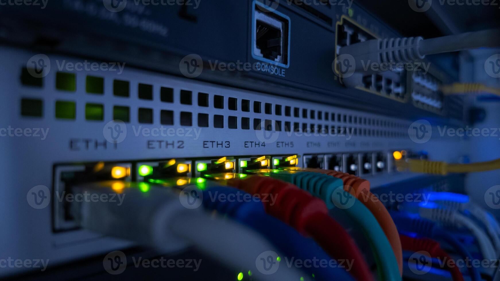 Close-up of blinking LEDs on network switch showing data flow and connection activity, perfect for IT, technology, and data concepts photo