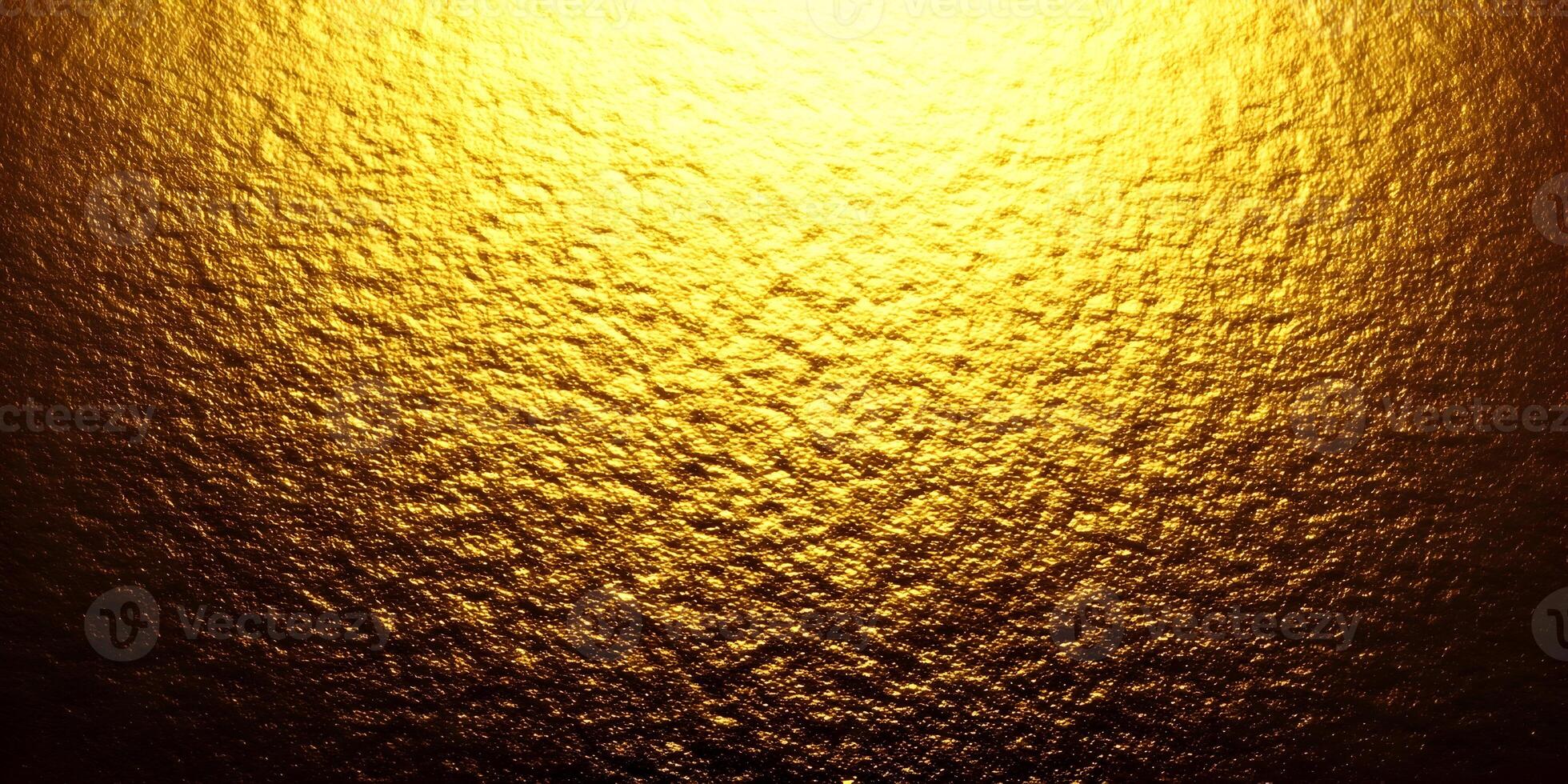 A bright golden textured surface with light shining from above creating a rich and opulent abstract background photo