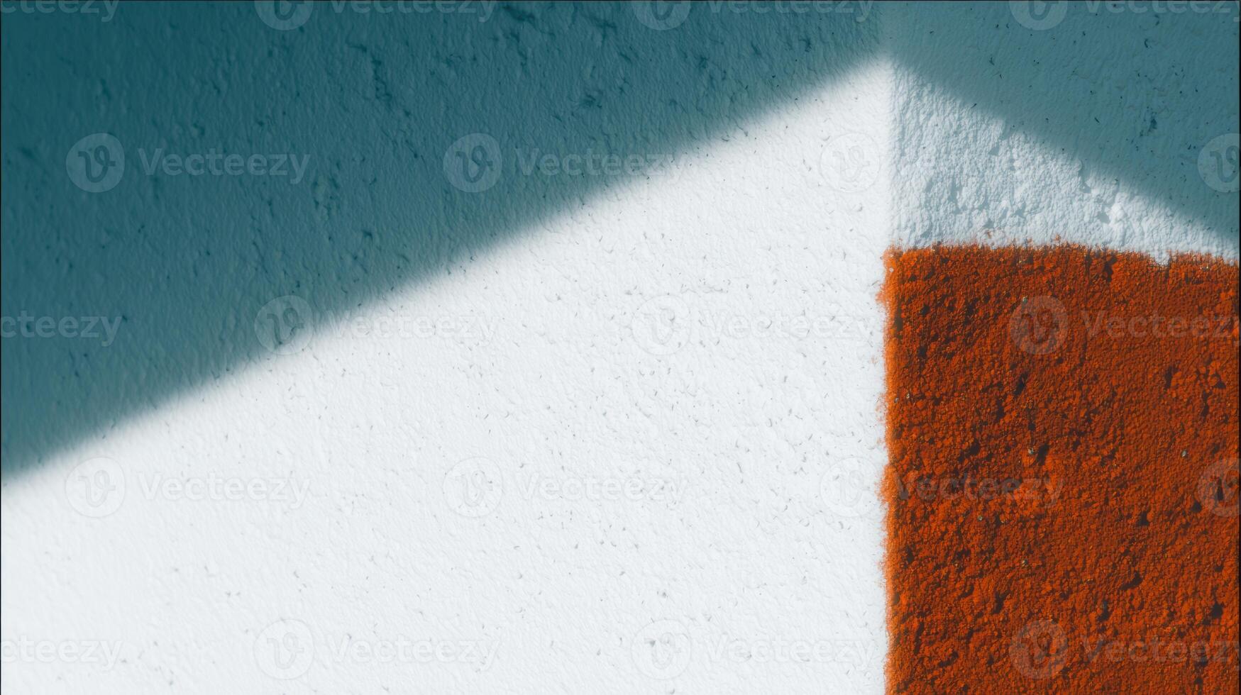 Colorful geometric patterns on a textured wall photo