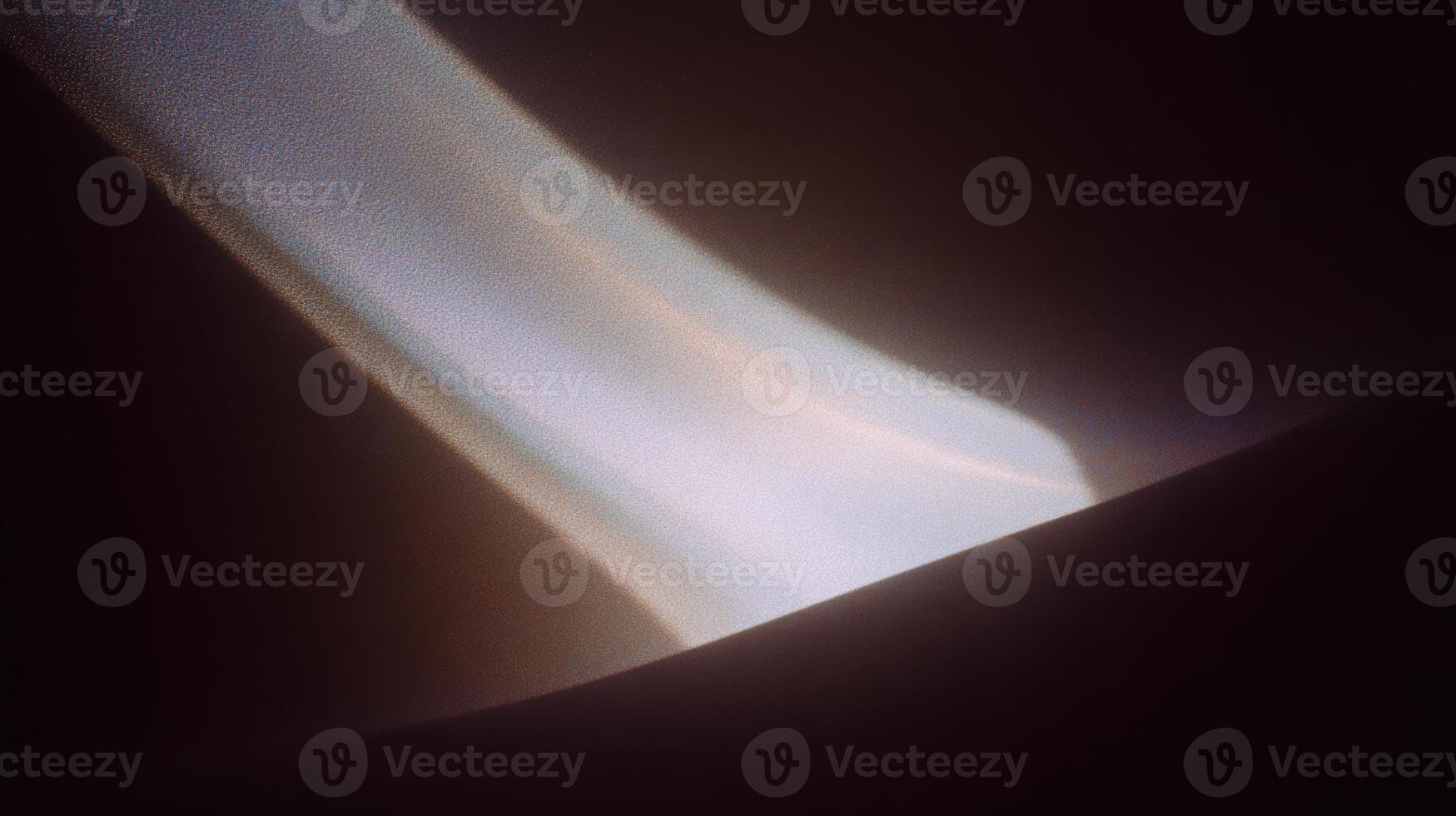 Illuminated abstract light pattern on dark surface photo