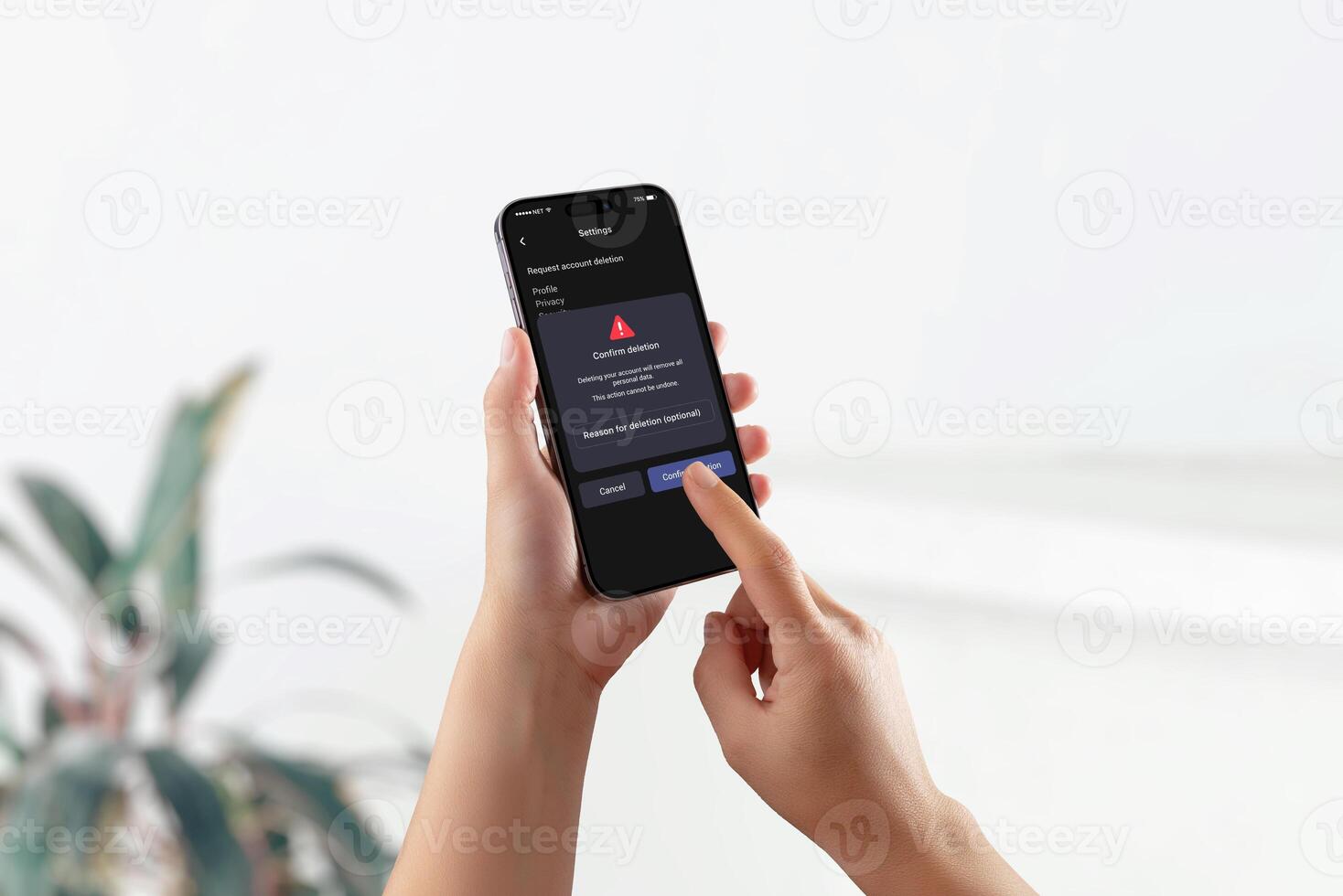 Smartphone screen showing GDPR interface with warning and confirmation for account deletion, representing right to erasure and user data control. photo