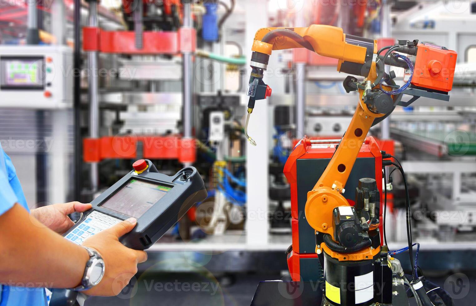 Engineer check and control automation Modern Robot system in factory photo