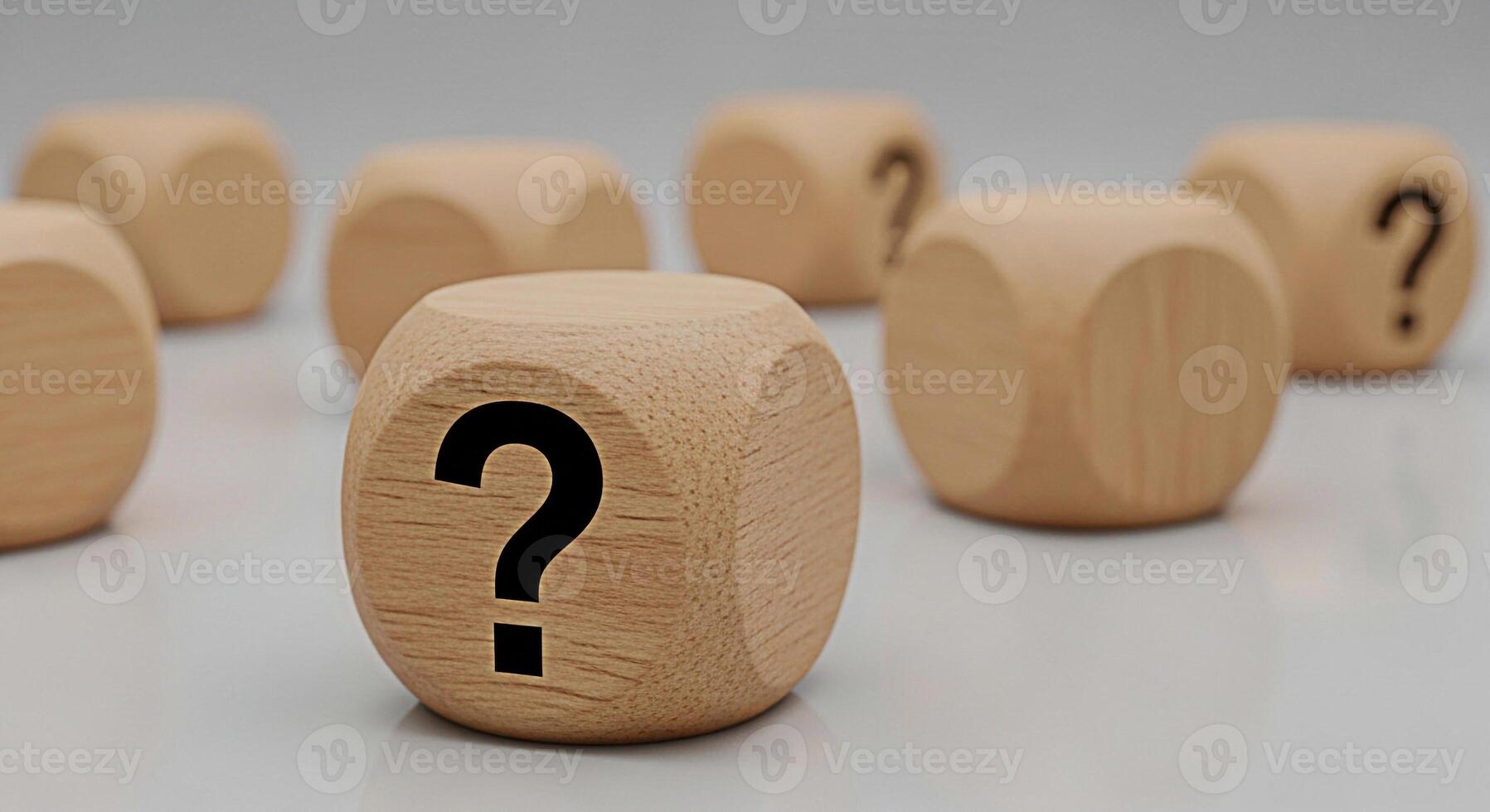 Wooden dice displaying question marks on a reflective surface symbolizing uncertainty and the search for answers in business education and personal life creating a mood of curiosity and inquiry photo