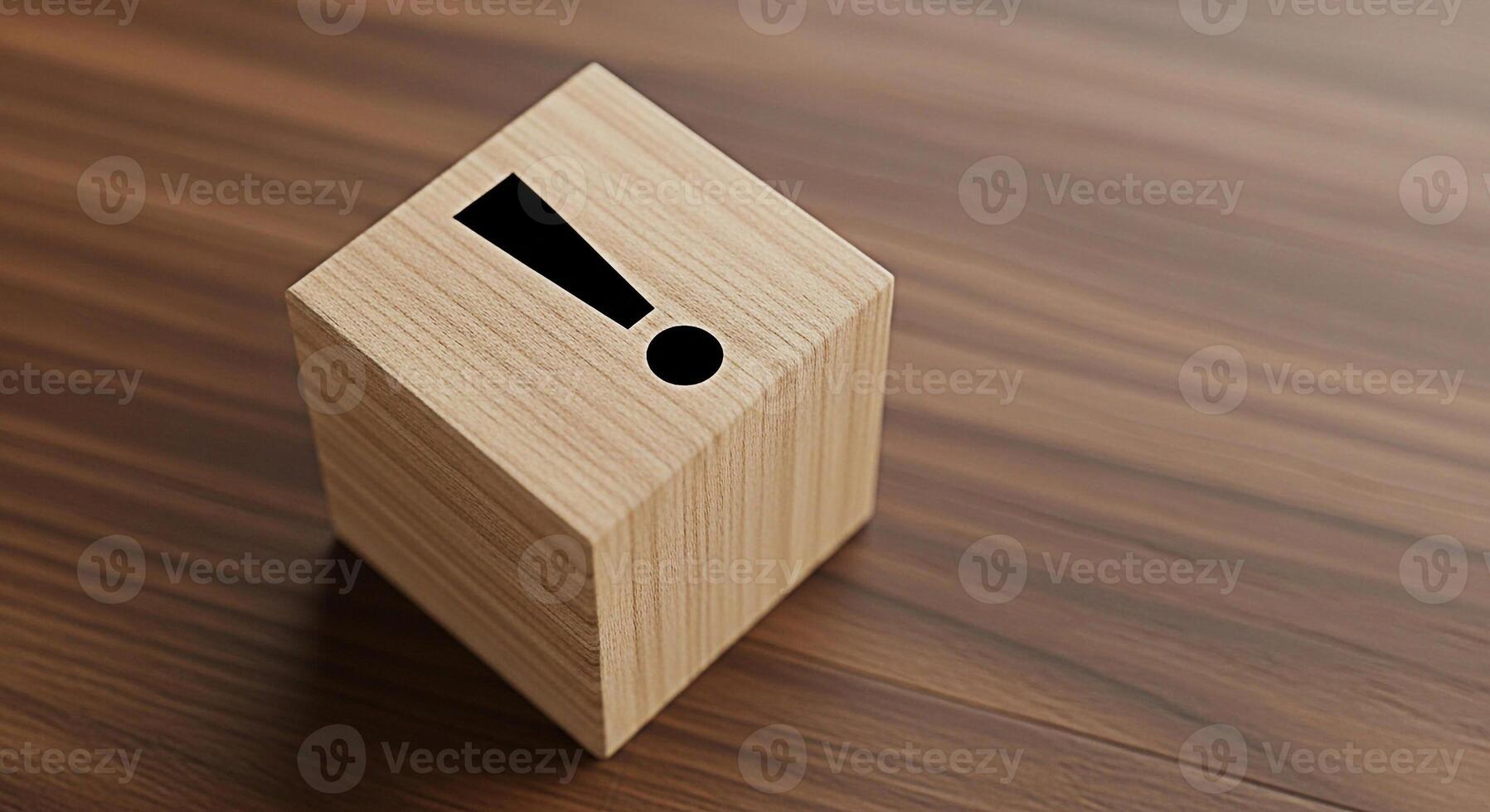 Wooden cube displaying a black exclamation mark on a brown wooden surface symbolizing urgency and attention to detail in a minimalist and modern setting conveying a sense of importance and warning photo