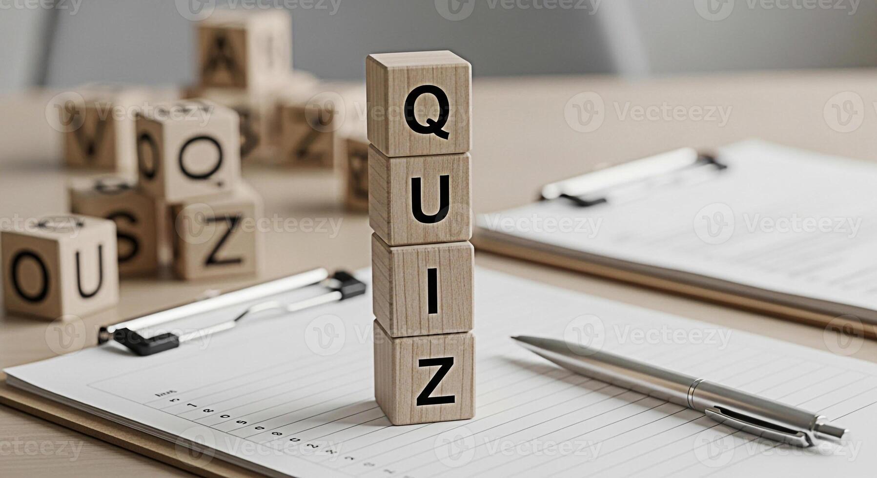 Wooden blocks spelling QUIZ on a desk with a clipboard and pen representing knowledge assessment and learning in an educational or corporate setting creating a sense of challenge and intellectual curi photo