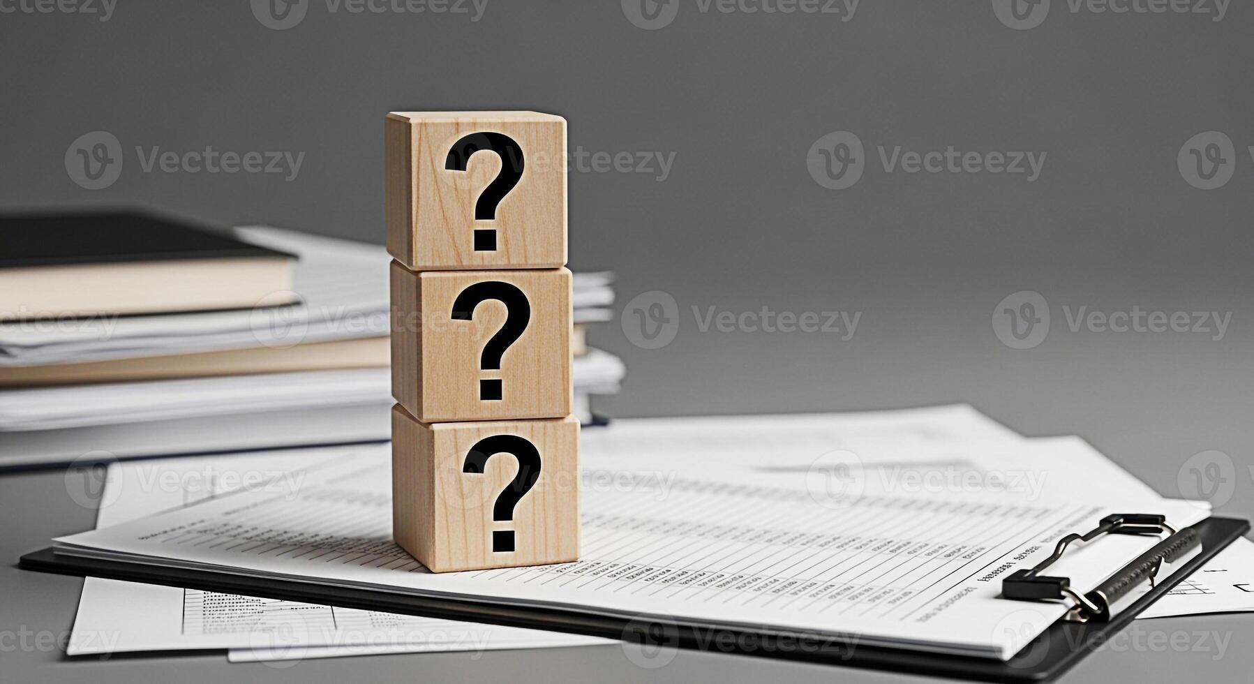Stacked wooden blocks displaying question marks on a clipboard in a professional office environment symbolizing uncertainty problemsolving and the search for answers in business and decisionmaking pro photo