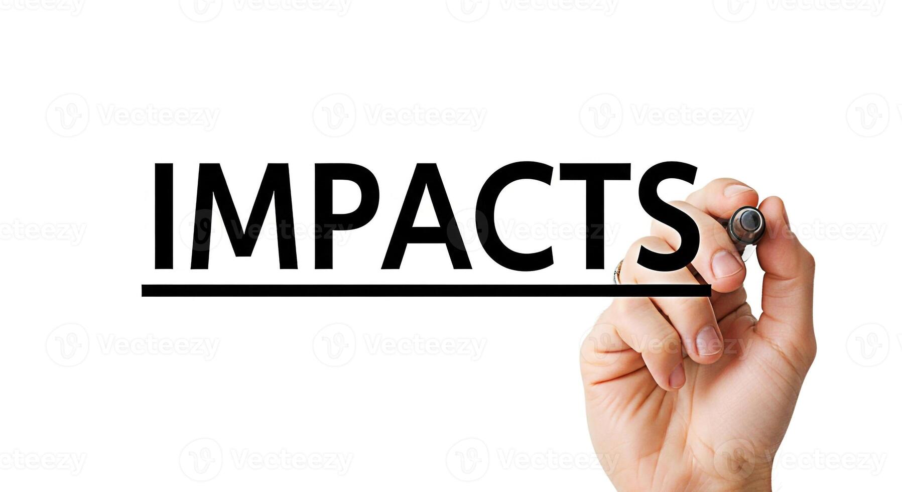 Hand underlining the word Impacts on a whiteboard with a black marker emphasizing the significance of consequences and effects in a business or educational setting conveying a message of importance photo