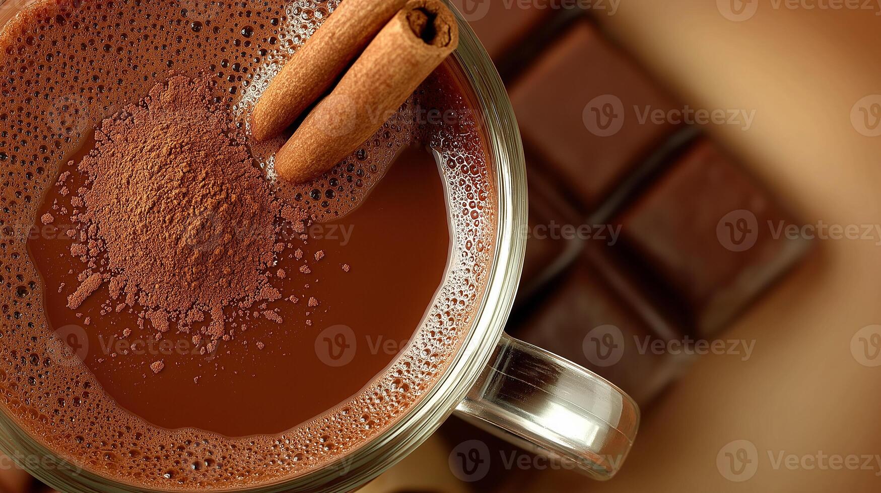 Hot chocolate mug topped with cocoa powder and cinnamon sticks, set against a neutral beige background, creating a warm and inviting atmosphere with copy space photo