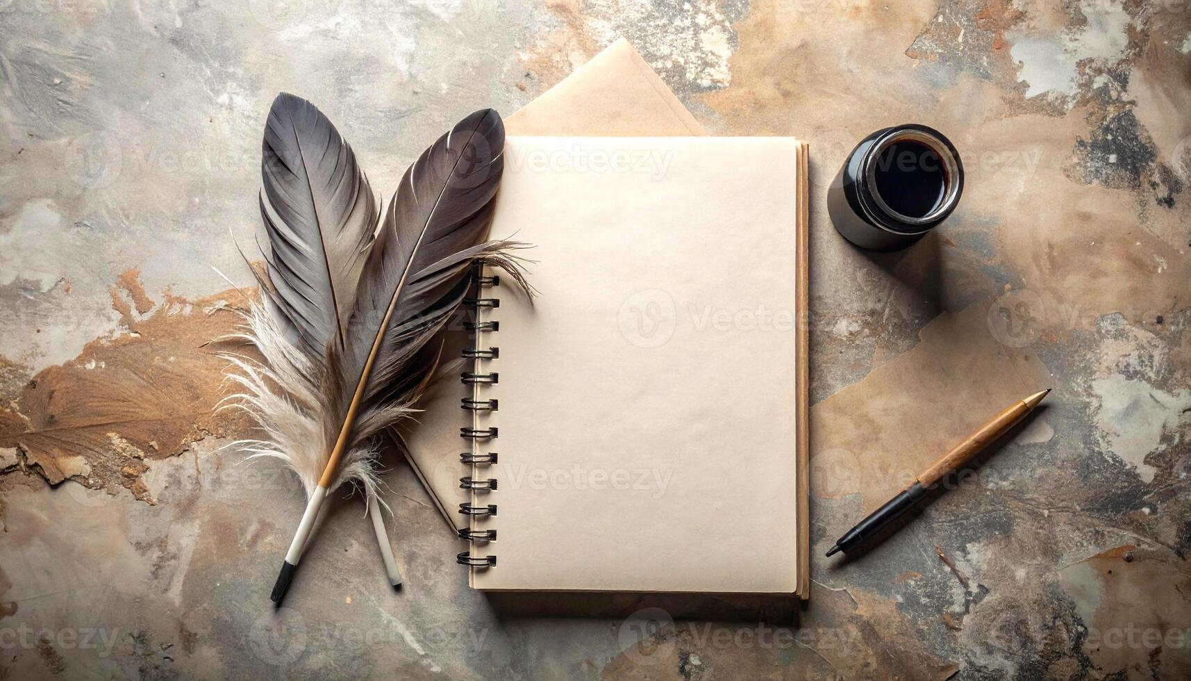 Top down view of a feather quill, ink bottle, notebook, and paper on a desk surface background image photo