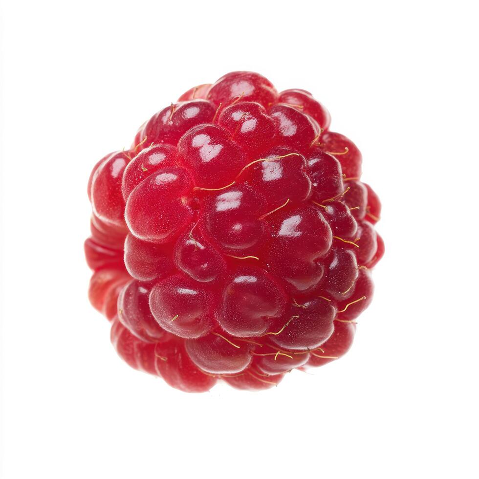 A single ripe red raspberry isolated on a white background, showcasing its intricate texture and vibrant color photo