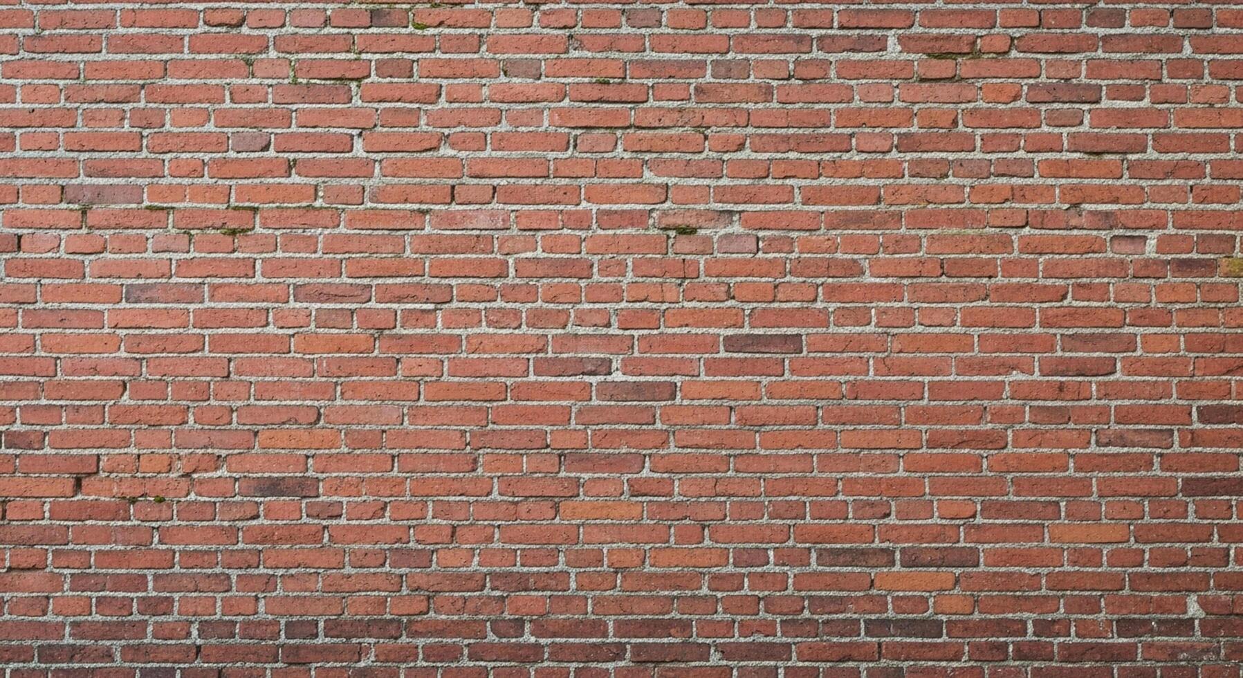 Authentic weathered red brick wall texture provides a robust, classic backdrop for your design projects seeking rustic charm. photo