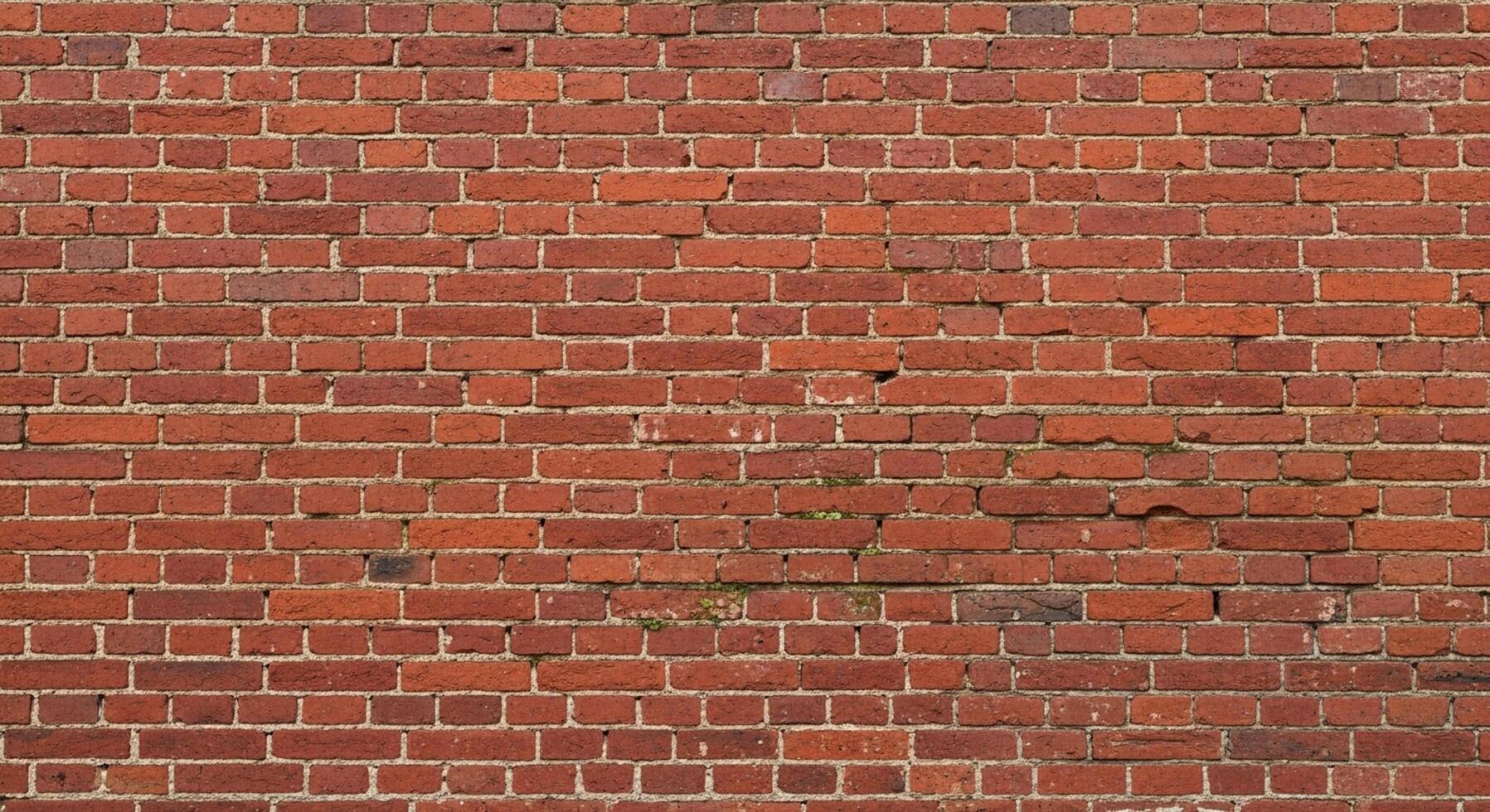 Textured red brick wall surface providing a classic, rustic architectural background for design projects photo