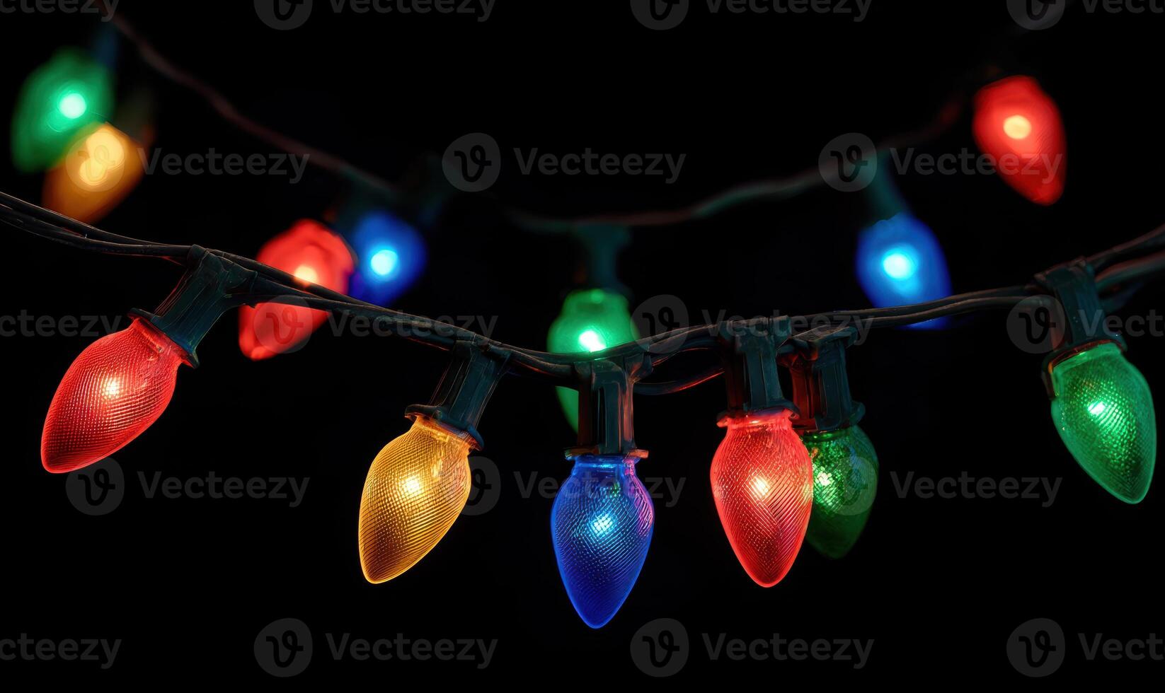 A string of Christmas lights with many different colored bulbs photo