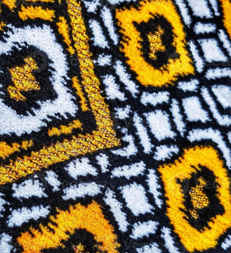 Abstract Geometric Pattern with Gold Line on Detailed Textured Textile photo