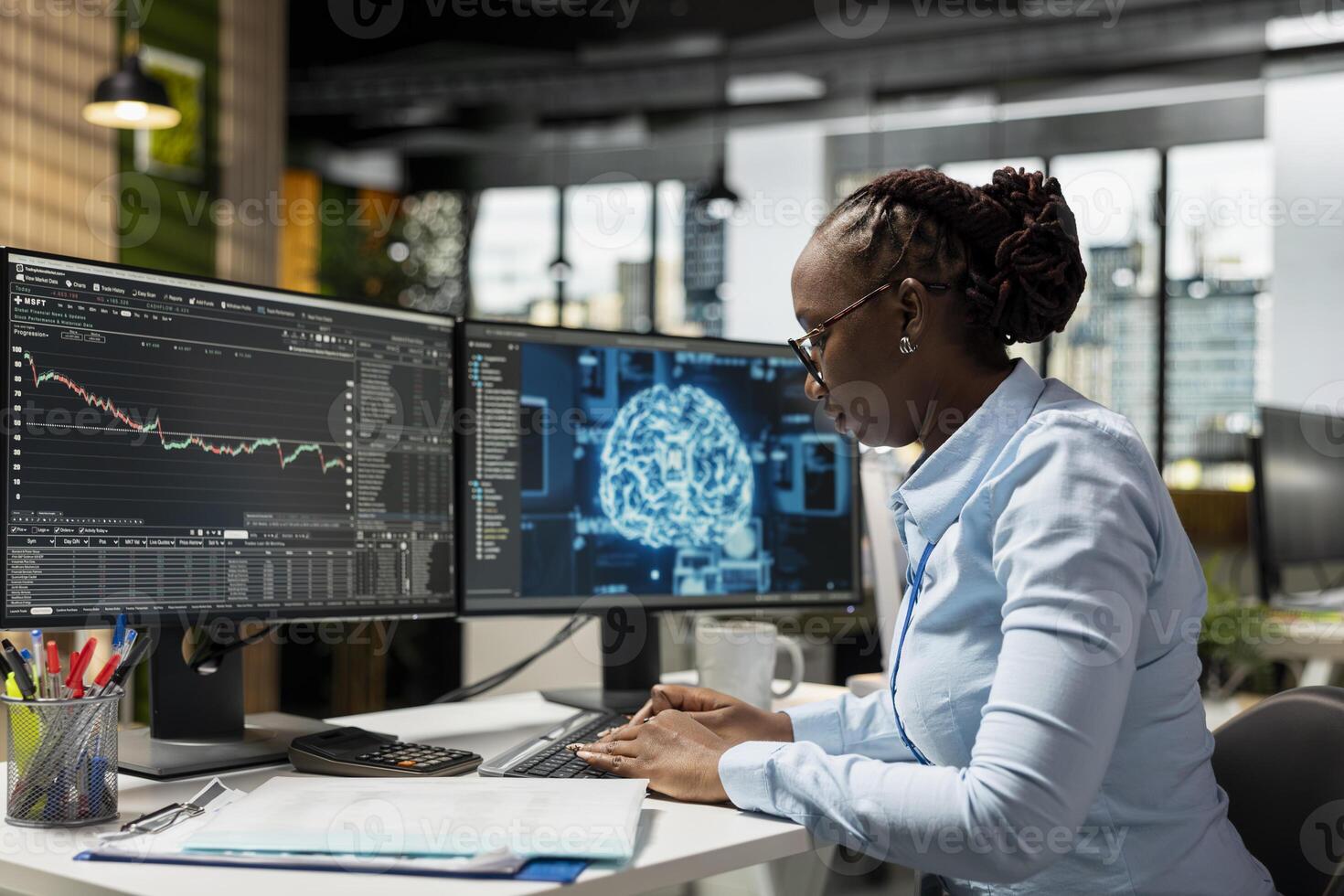 Trader running AI technology on computer to do automated trading and portfolio rebalancing. African american woman applying deep learning algorithms to analyze complex market data photo