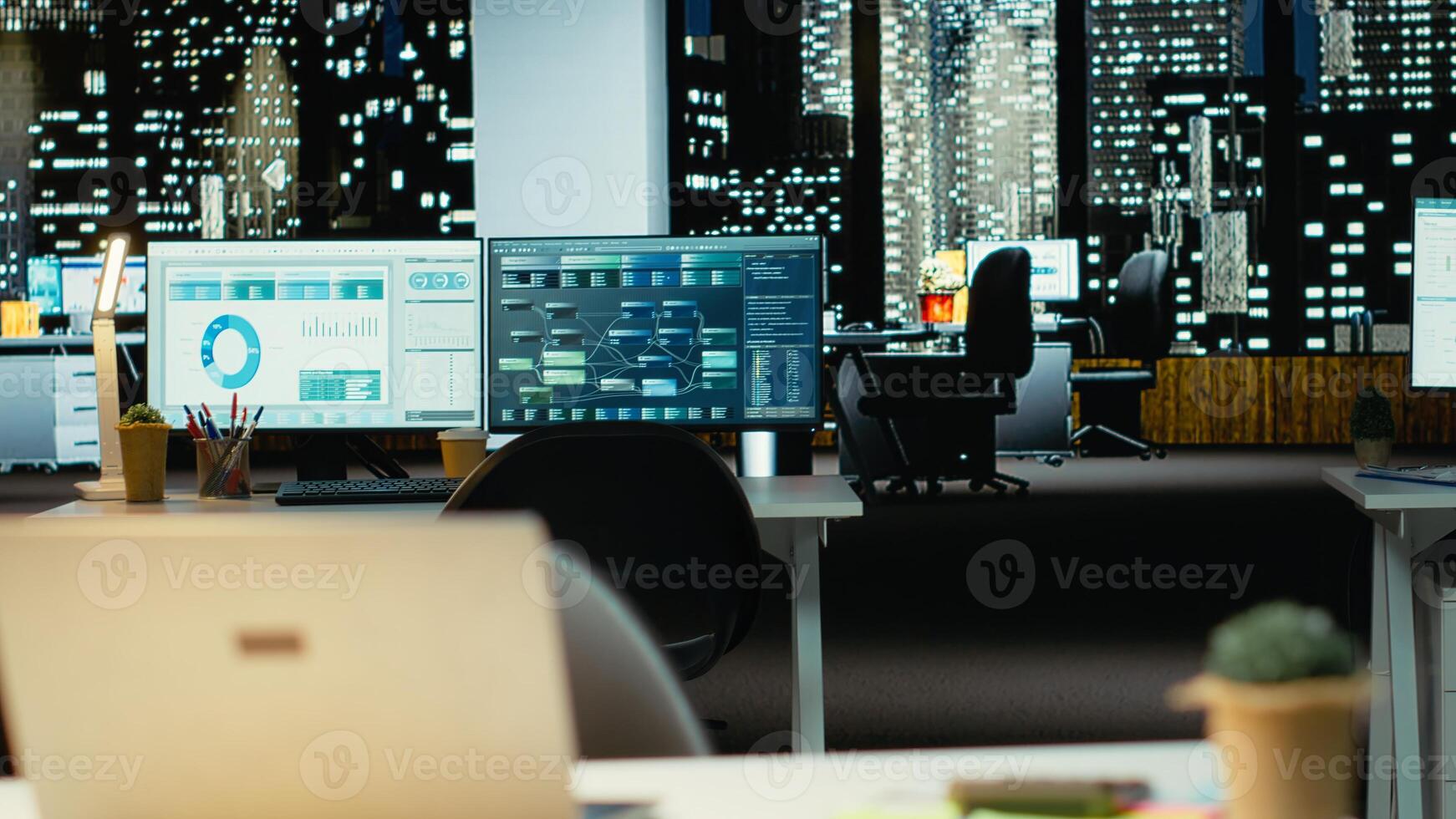 Luxurious modern office space with dual monitors and laptop, empty desks showcasing important data analytics and insight for management and business administration tasks. Forecasting. photo