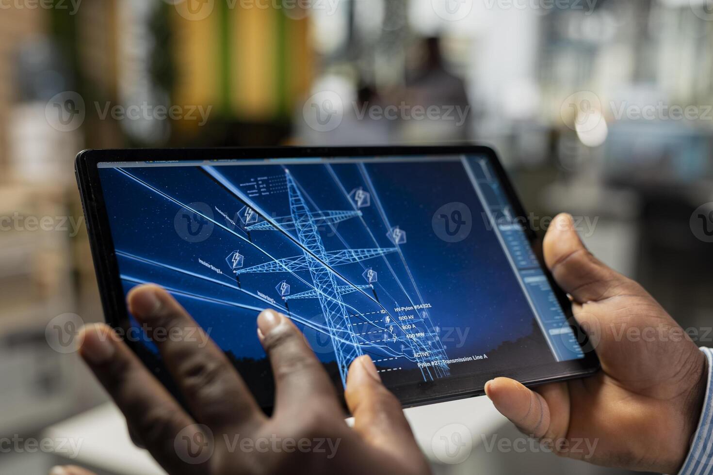 Close up of engineer reviewing electrical grid data on tablet to identify energy audit findings and upgrade needs. Worker reads transmission tower efficiency metrics analytics dashboard on device photo