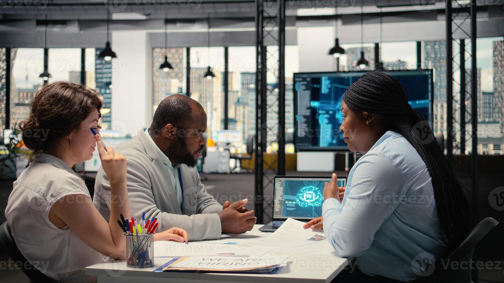 HR team uses AI and machine learning systems to scan and evaluate CVs, neural networks and smart software to support candidate selection after the recruitment interview process. Camera A. photo