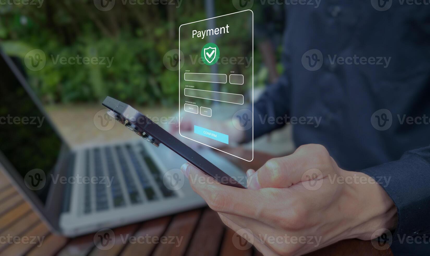 Augmented reality mobile payment interface with shield icon and confirm button photo