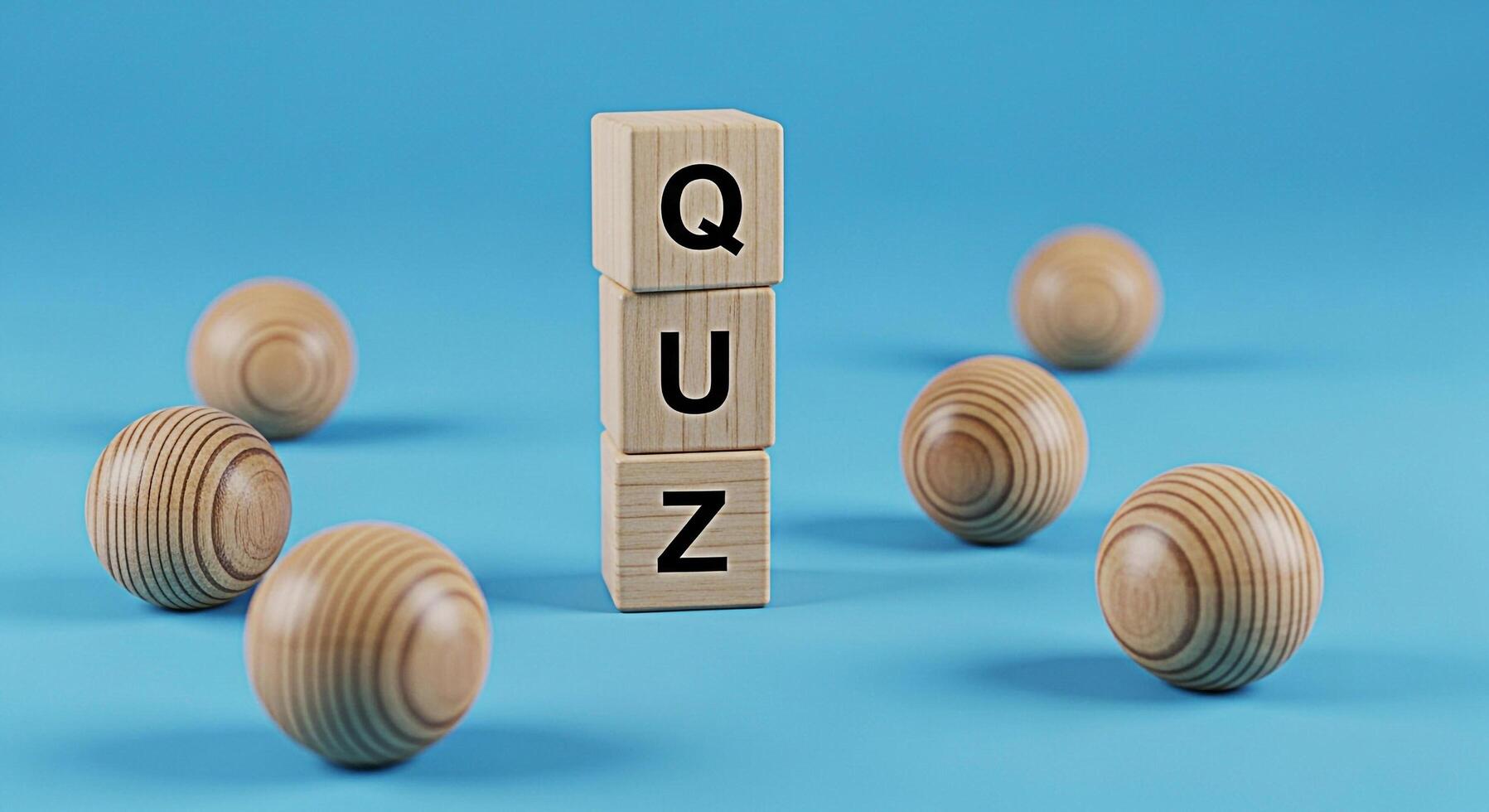 Wooden blocks spelling QUIZ on a blue surface surrounded by wooden balls creating a playful and educational atmosphere ideal for online learning platforms and interactive educational content photo