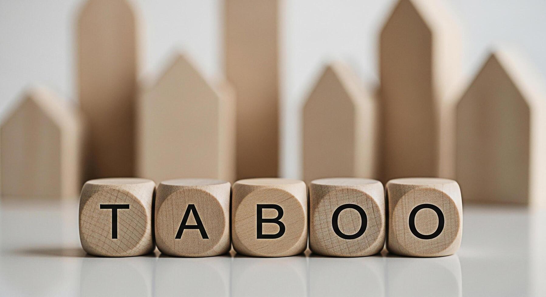 Wooden blocks spelling TABOO in a minimalist setting representing forbidden topics and boundaries creating a sense of mystery and intrigue ideal for discussions on social norms and cultural sensitivit photo