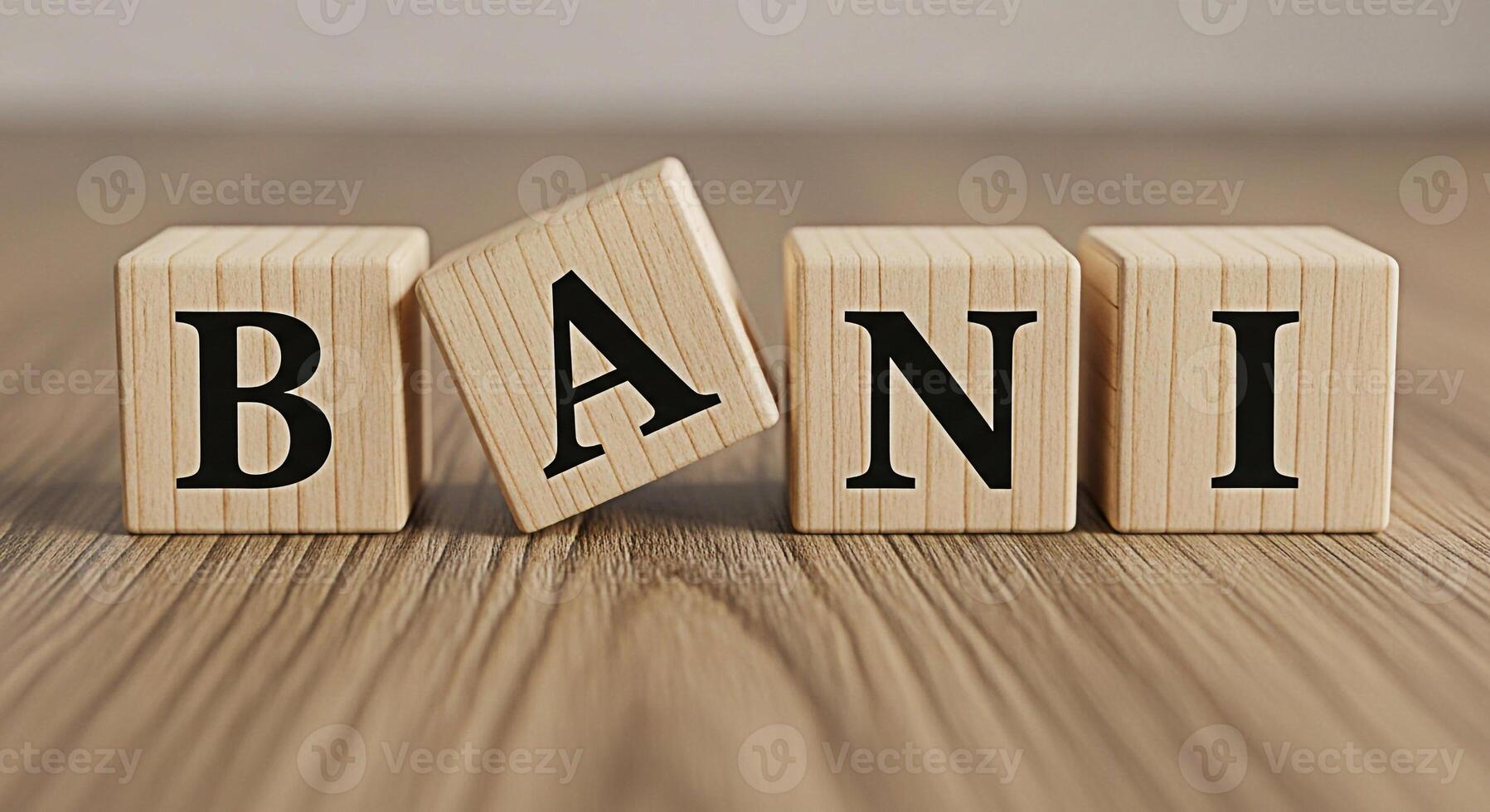Wooden blocks spelling BANI on a wooden surface with the A block tilted creating a playful and educational atmosphere for learning alphabets and language skills promoting early childhood development photo