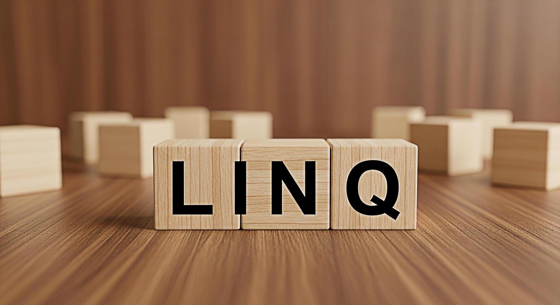 Wooden blocks spelling LINQ on a wooden surface representing a programming language and data querying conveying a sense of technology and innovation in a modern clean environment photo