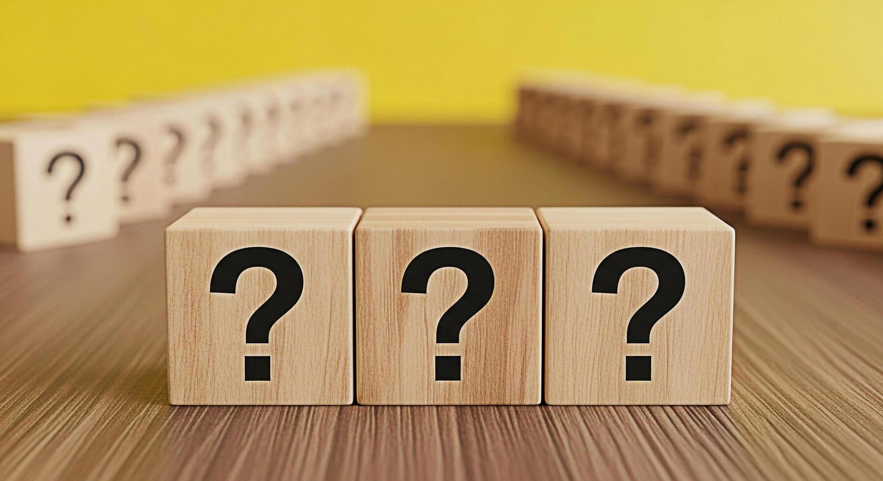 Wooden blocks displaying question marks on a textured wooden surface symbolizing uncertainty and the need for answers in a business or educational context creating a sense of inquiry and problemsolvin photo