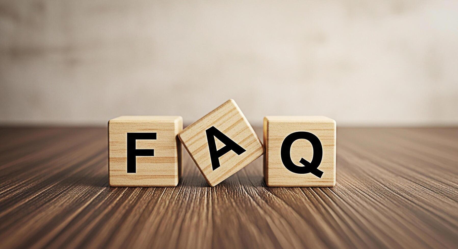FAQ wooden blocks displaying information on a wooden surface representing frequently asked questions and knowledge base in a simple and accessible way promoting clarity and understanding photo