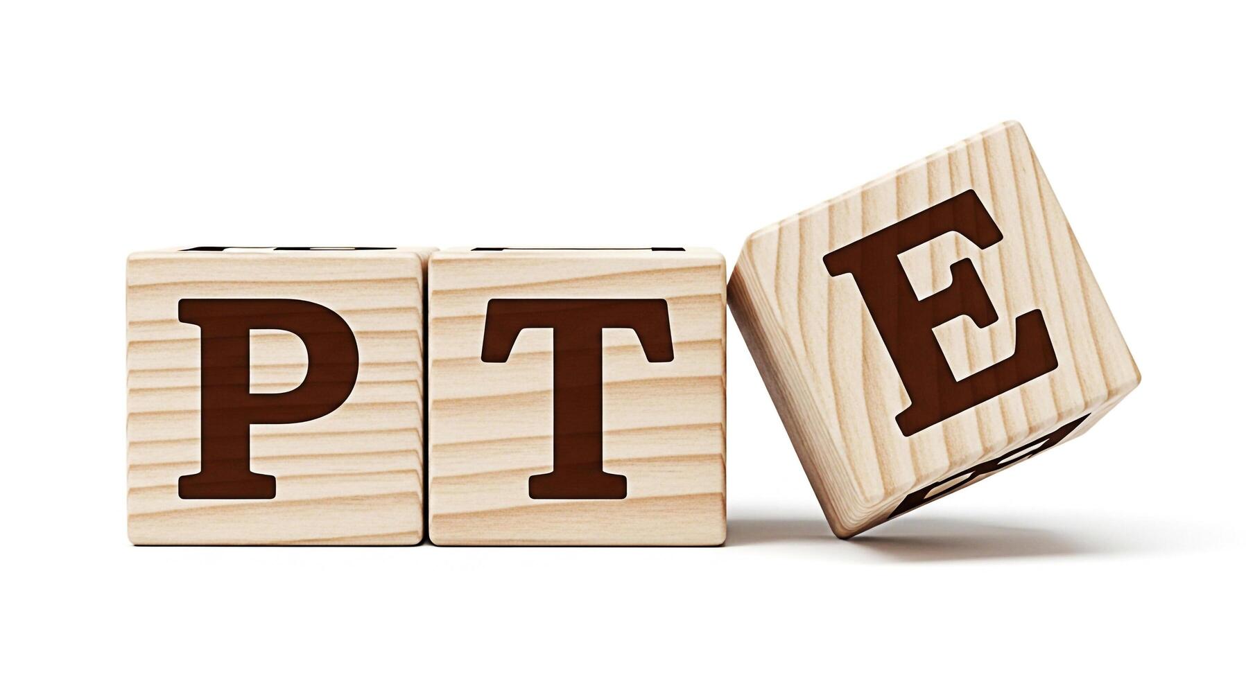 Wooden blocks spelling PTE on a white surface representing the Pearson Test of English conveying a message of education and preparation for language proficiency assessment in a clean minimalist settin photo