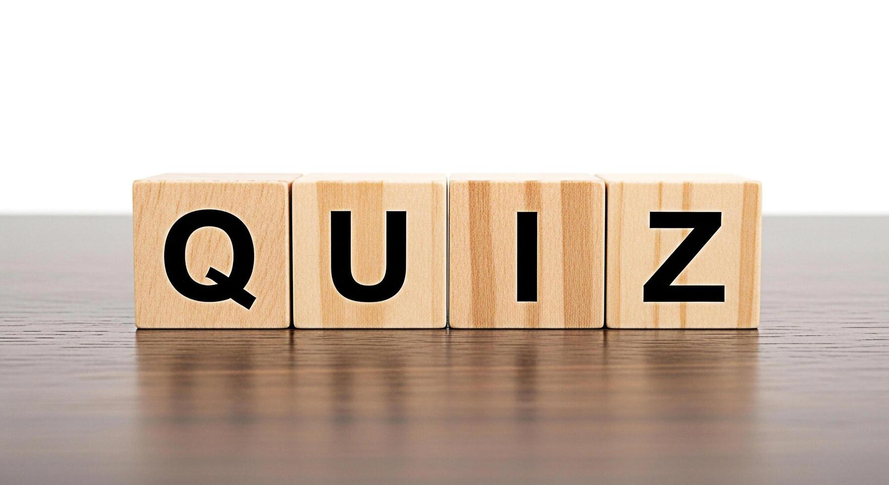 Wooden blocks spelling QUIZ on a polished wooden surface creating a bright and educational atmosphere perfect for testing knowledge and engaging in trivia challenges in a classroom or online learning photo