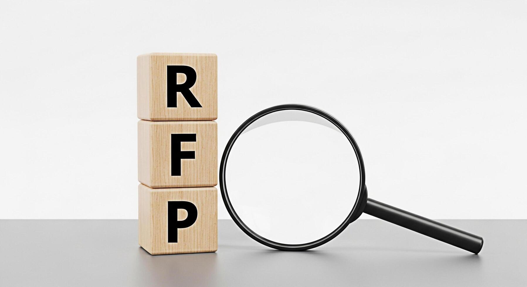 Wooden blocks displaying RFP are examined with a magnifying glass on a gray surface symbolizing the process of reviewing and understanding a Request for Proposal in a business setting emphasizing scru photo