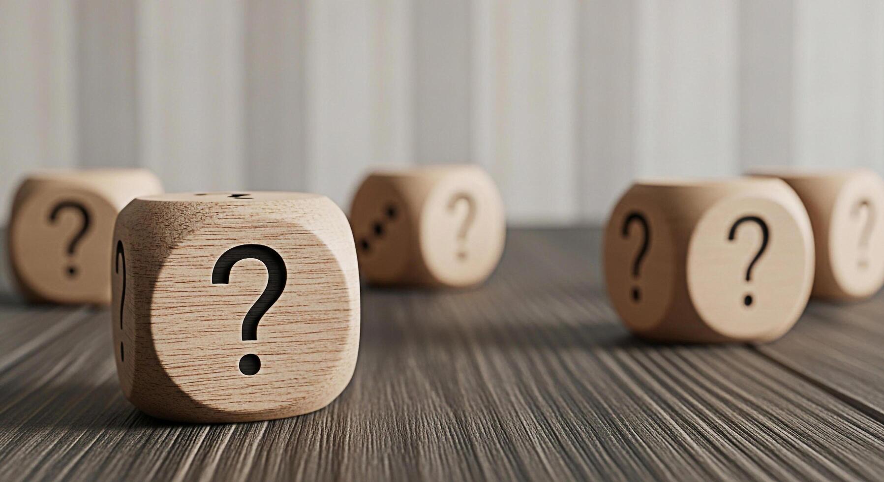 Wooden dice displaying question marks resting on a textured wood surface symbolizing uncertainty and the need for answers in a business or personal context creating a mood of contemplation and problem photo