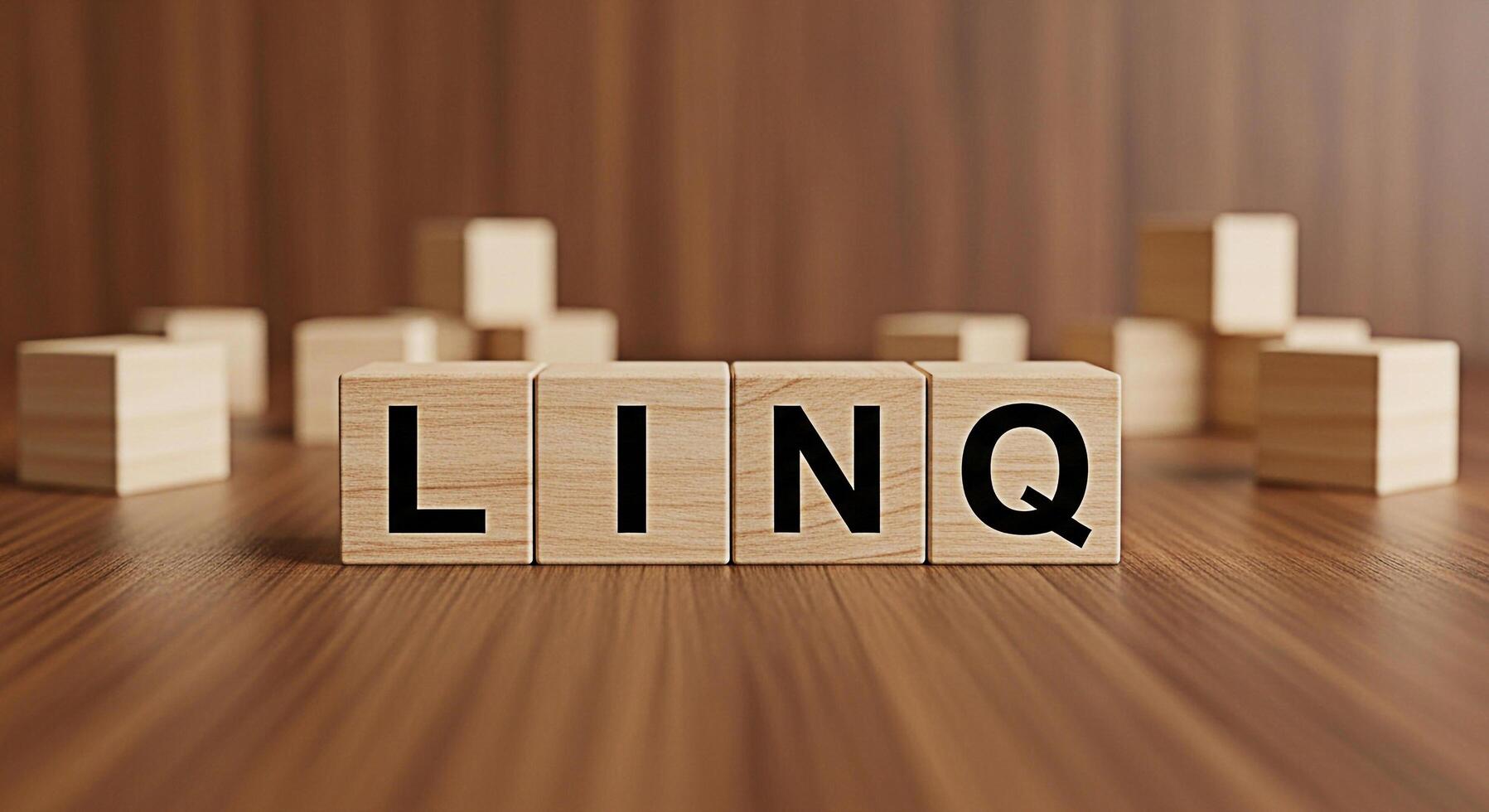 Wooden blocks spelling LINQ on a wooden surface conveying a sense of connection structure and organization in a warm inviting environment ideal for illustrating concepts related to data and programmin photo