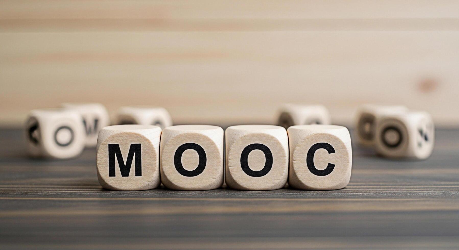 Wooden cubes spelling MOOC on a wooden surface representing online education and learning in a simple and minimalist setting conveying the concept of accessible knowledge and modern learning methods photo