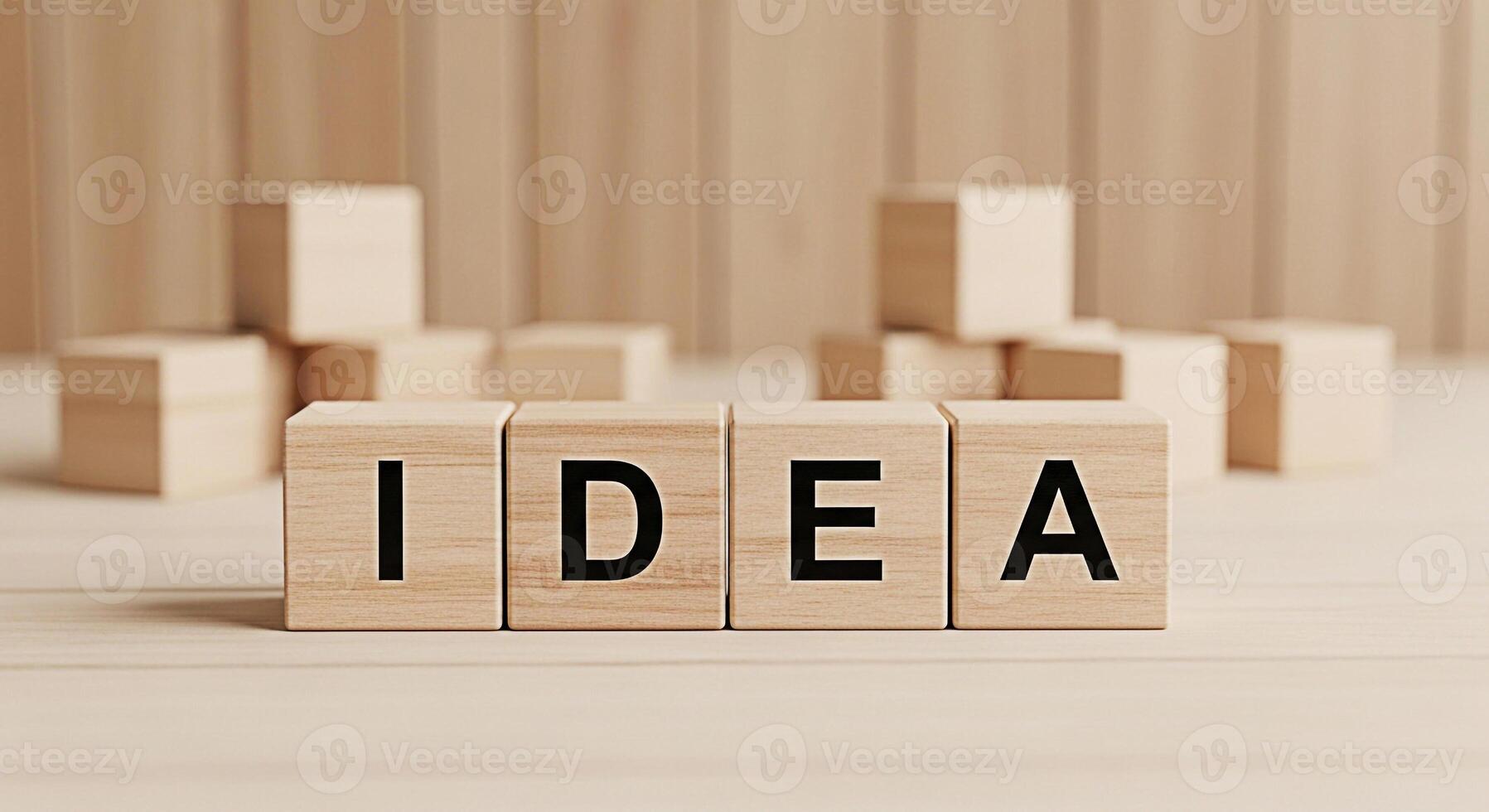 Wooden blocks spelling IDEA on a wooden surface symbolizing creativity and innovation in a minimalist and neutral setting fostering a sense of inspiration and problemsolving photo