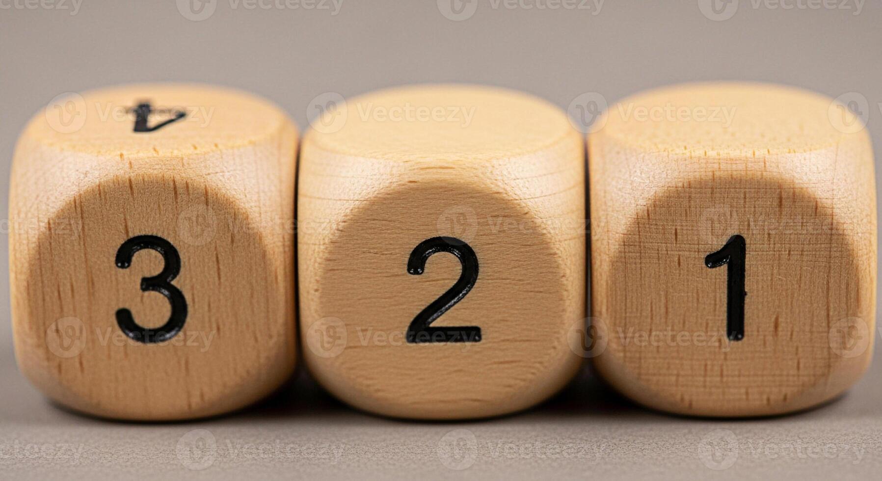 Wooden dice displaying sequential numbers in a closeup studio shot representing order sequence and numerical progression with a minimalist and educational concept photo