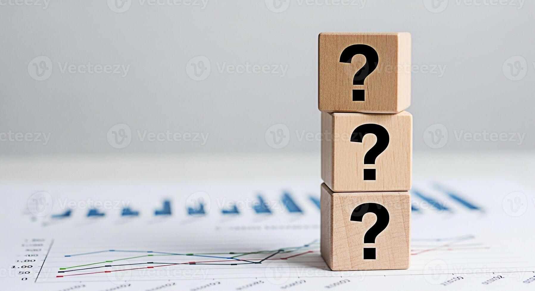 Stacked wooden blocks displaying question marks on a financial chart representing uncertainty in business analytics and investment decisions creating a mood of inquiry and problemsolving in a corporat photo
