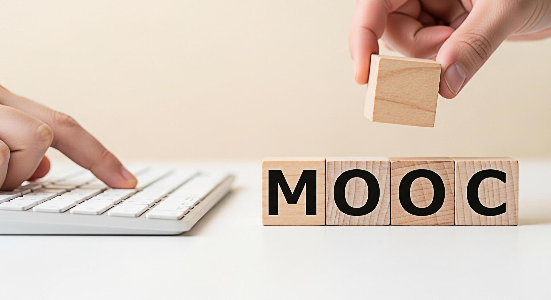 Hands arranging wooden blocks spelling MOOC on a white desk with a keyboard representing online education and accessible learning promoting knowledge and skill development in a modern educational sett photo