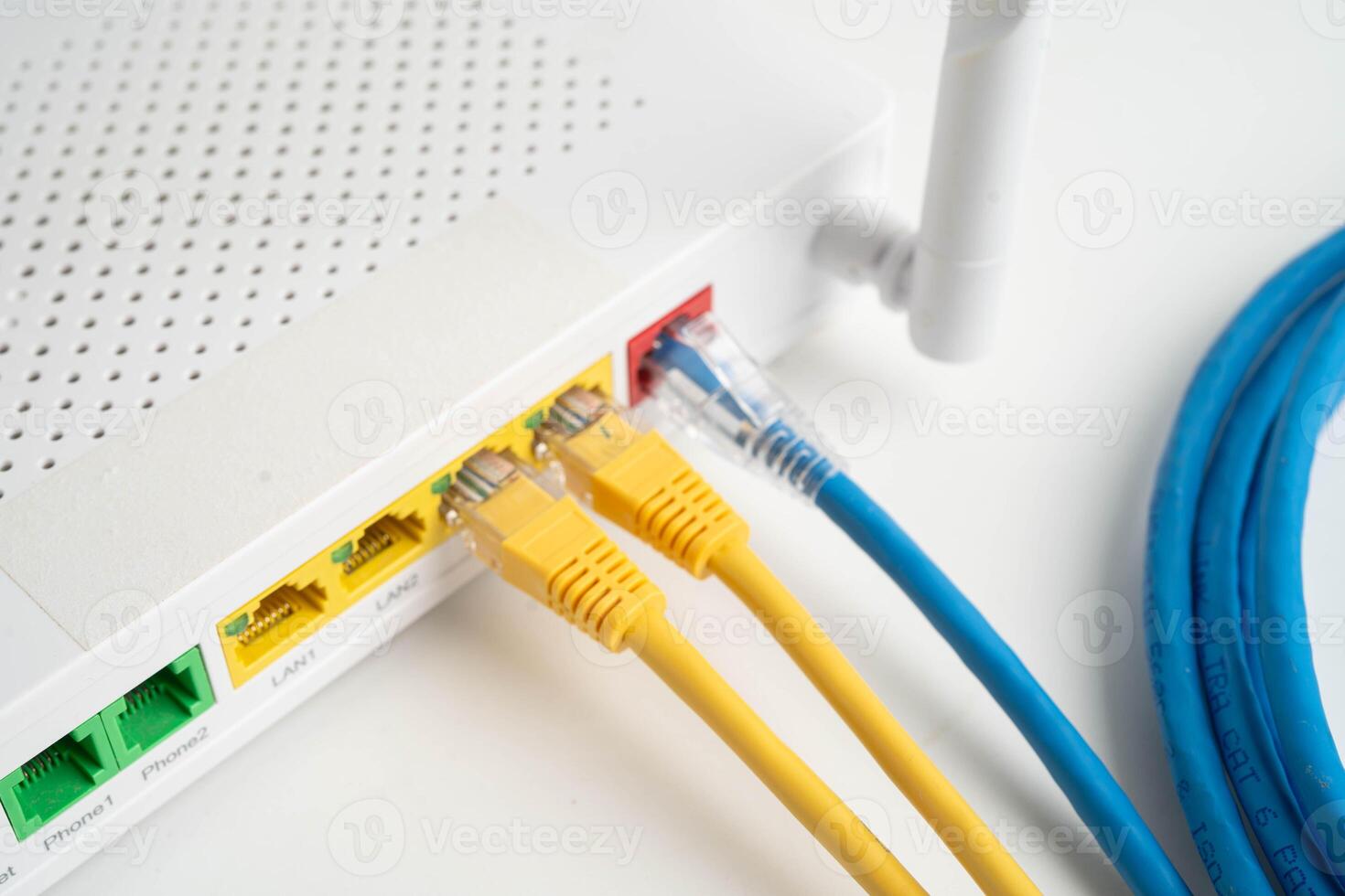 Ethernet cable with wireless router connect to internet computer network. photo
