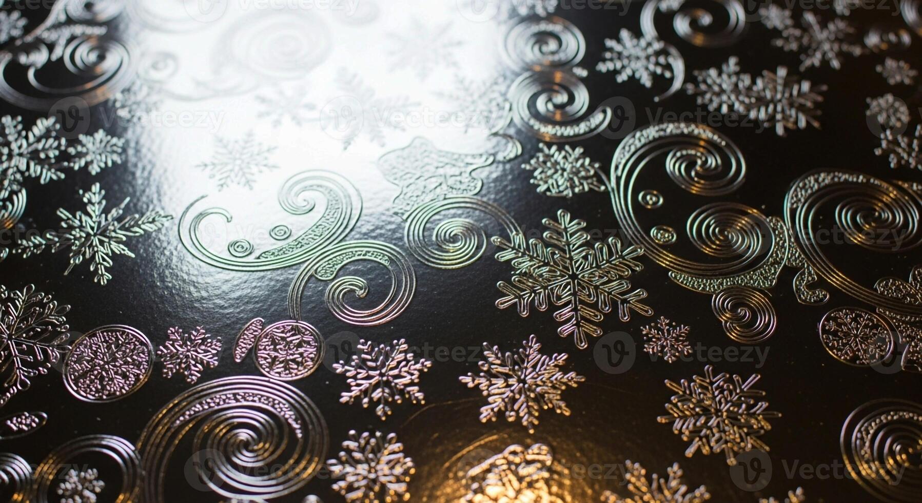 Intricate snowflake and swirl patterns etched onto a dark surface with a bright light source shining through photo