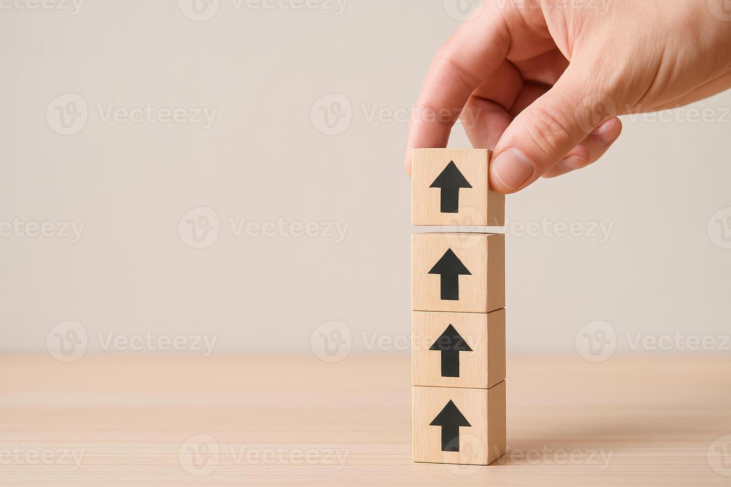 2026 planning roadmap concept with hand stacking wooden blocks showing upward arrows symbolizing growth and progress on light wooden surface with neutral background photo