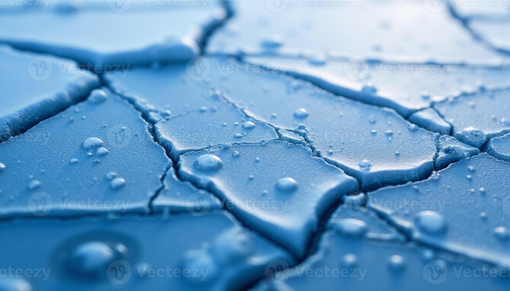 Abstract macro view of a wet patterned expanse with the cool blue color dominating the composition photo