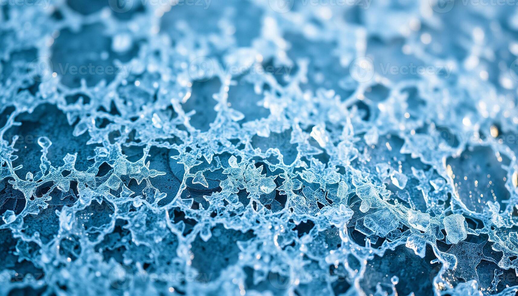 Abstract pattern of the fractured ice mass with varying shades of light and deep blue creating depth photo
