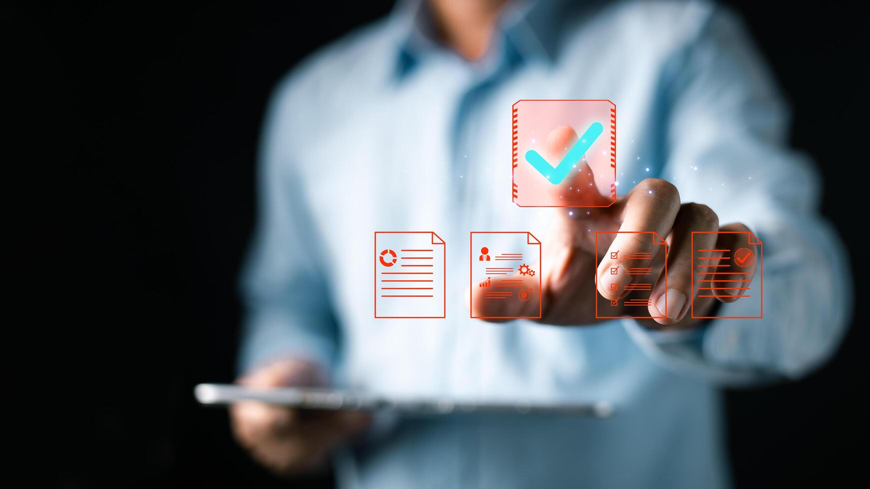 A person interacts with a digital interface featuring floating icons of documents, charts, and a large checkmark, symbolizing document, digital, approve processes in a modern paperless workflow. photo