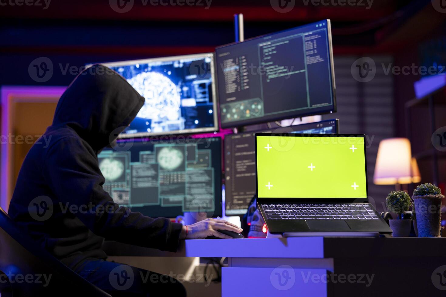 Hacker using isolated screen laptop to extract military secrets data from secure digital systems. Cybercriminal using mockup notebook device in hidden base, running espionage software photo
