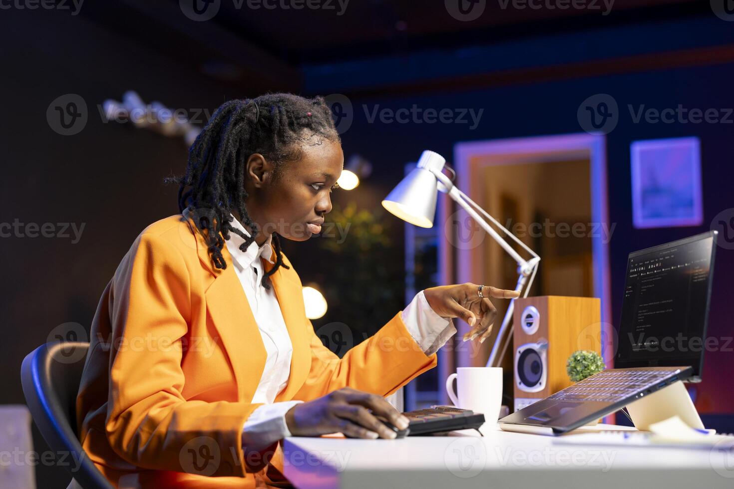 Software developer at laptop coding, creating program, implementing algorithms. IT expert in home office working with code editor, building applications, optimizing performance photo